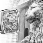 Lion’s figure in front of Cathedral Saint Lawrence in Genoa, Ita